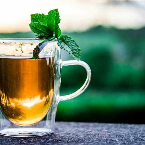 A tea in a comfortable clear cup