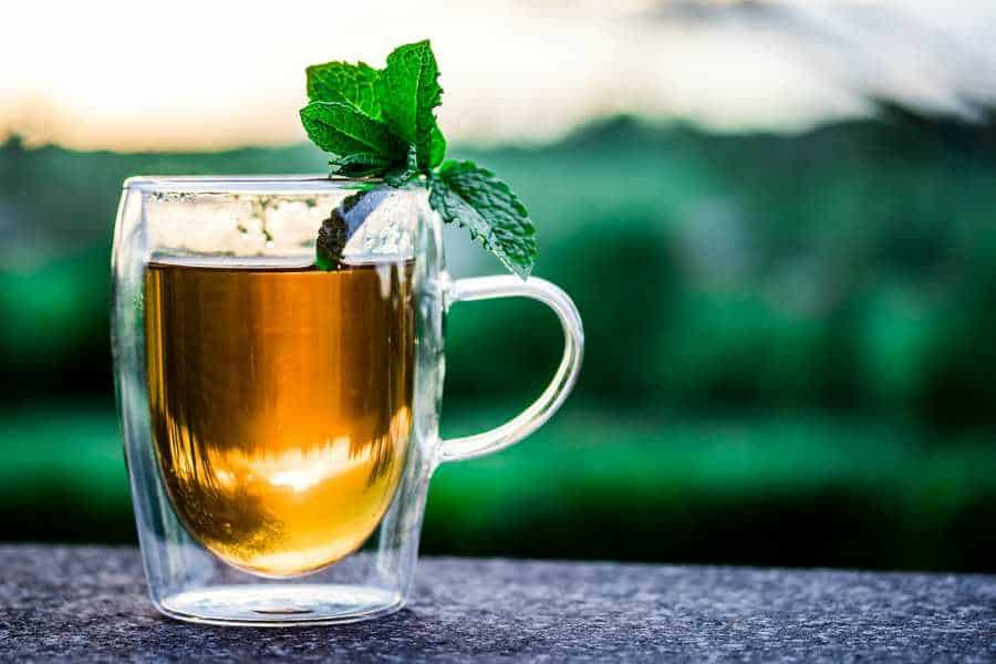 A tea in a comfortable clear cup