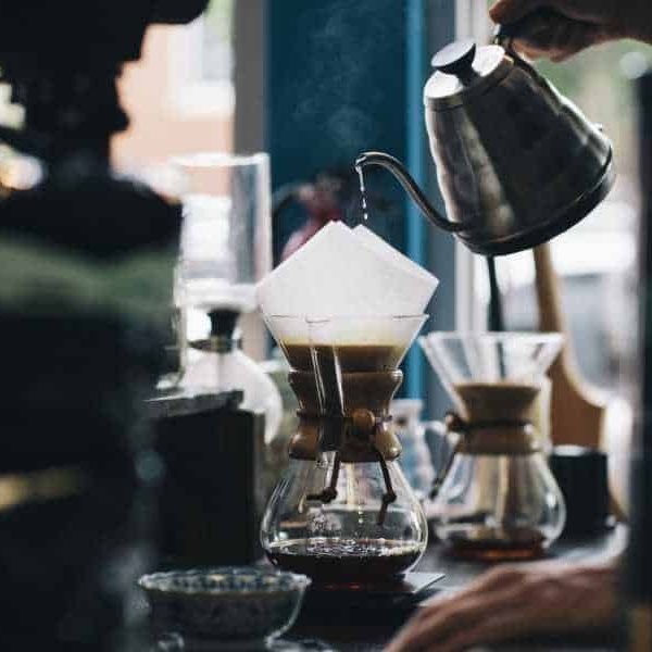 Hot coffee being poured from pot