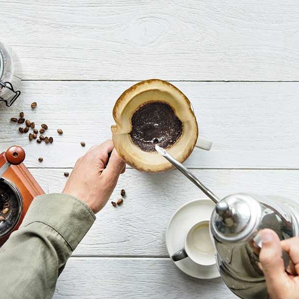 A man making pour over coffee