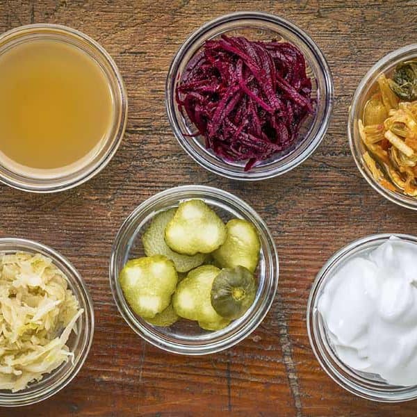 Cups of Probiotics are lined up on a table at a Frisco coffee shop.