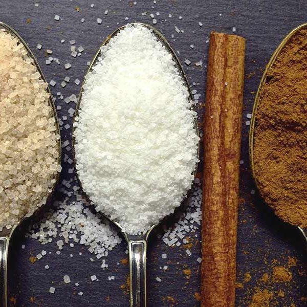 Spoons full of ground cinnamon and sugar: a couple of important ingredients at our San Marcos TX coffee shop.