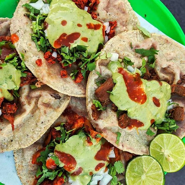 Vegetarian Breakfast Ideas: Chickpea & tofu tacos topped with cilantro and salsa