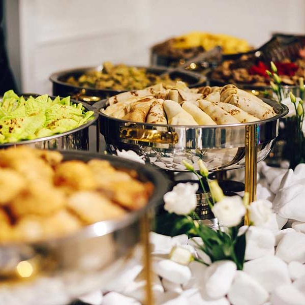 A buffet of catered food at an event