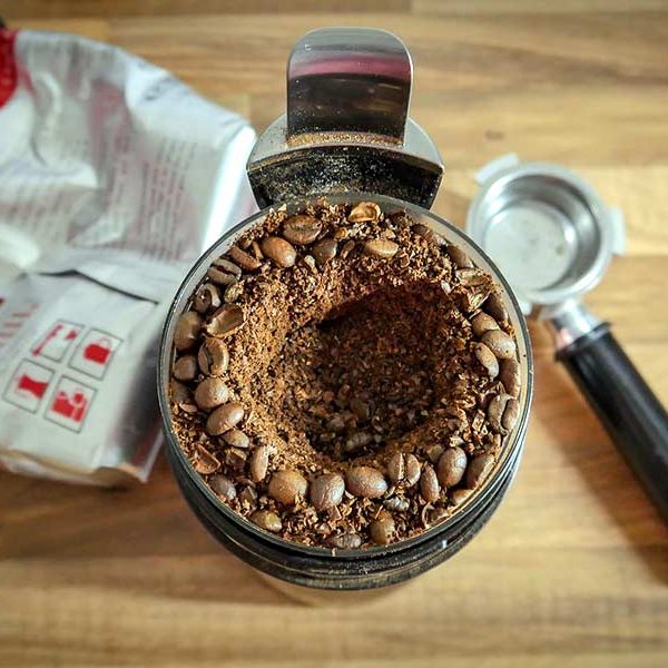 Coffee beans in a food processor from a coffee in Frisco TX