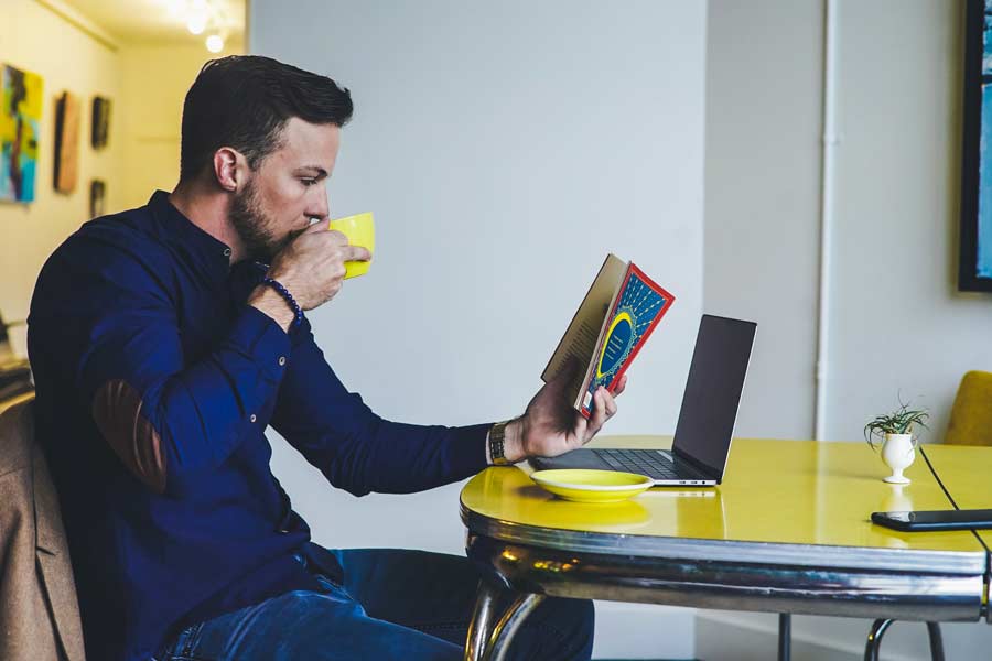 Man studying at a Frisco Texas coffee shop