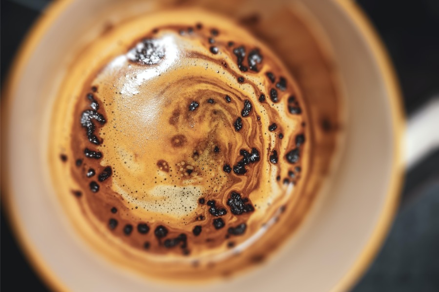 instant coffee in San Marcos dissolving in a cup viewed from above