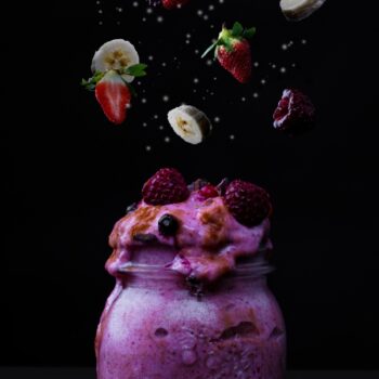 Ingredients falling into a prepared Frisco smoothies