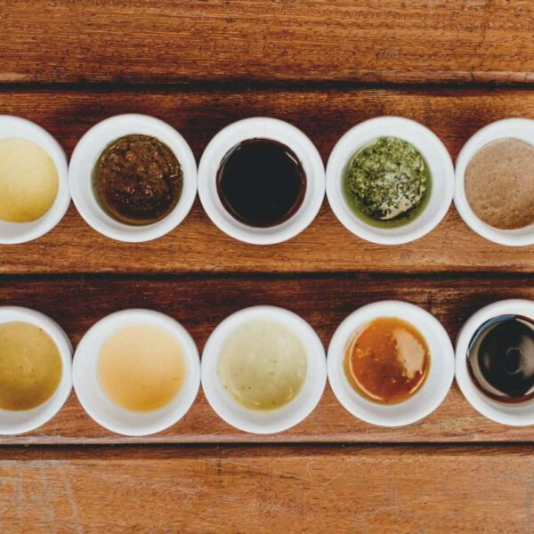 Flat-lay photography of a variety of different teas in cups arranged into a grid