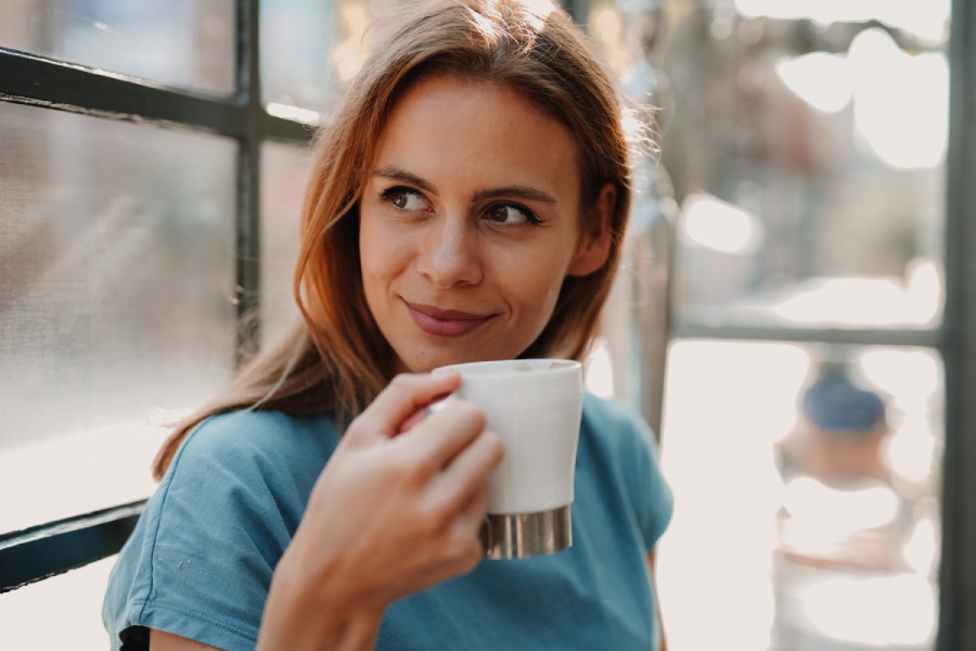 woman enjoying a nice hot drink