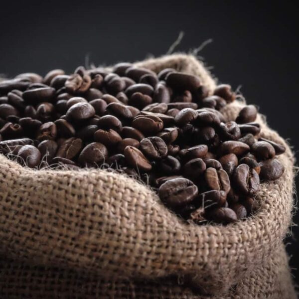 Coffee beans in a rustic bag