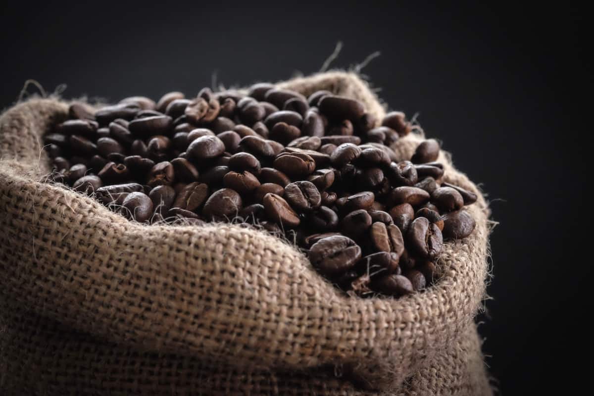 Coffee beans in a rustic bag