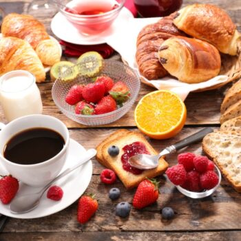 An image of a delicious breakfast with a cup of hot coffee