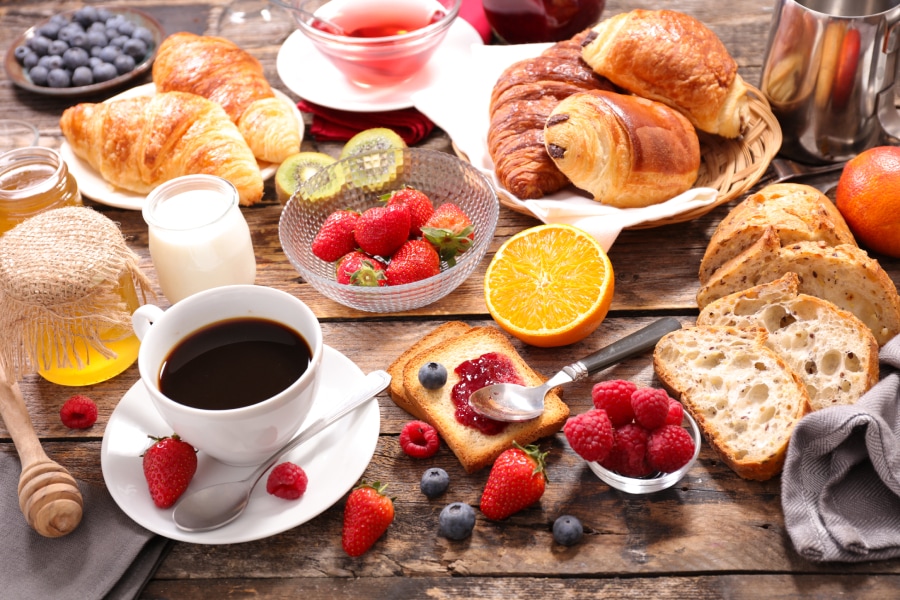 An image of a delicious breakfast with a cup of hot coffee